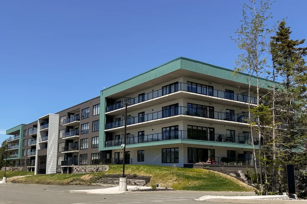 Exterior of Shiraz Gardens Pinot Blanc apartment building in Hammonds Plains, Nova Scotia
